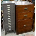 A STAINED WOOD FILING CABINET, C1930, 94CM H AND A METAL FILING CABINET