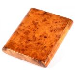 A BURR MAPLE CIGARETTE CASE WITH INTEGRAL HINGE, 8.5CM L, EARLY 20TH C