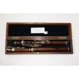 A KEITH PROWSE WOODEN NINE KEYED FLUTE, THREE PIECE BODY, STAMPED 48 CHEAPSIDE LONDON, WITH EIGHT