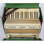 A HOHNER PIANO ACCORDION, CASED