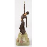 AN ART DECO STYLE SCULPTURE OF FOOTSTEPS AFTER CHIPARUS, ON ONYX PLINTH, 42CM H