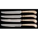 A SET OF TWELVE ELIZABETH II PISTOL HAFTED TABLE KNIVES AND A CARVING SET Sheffield Assay Office,