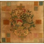 AN ENGLISH SAMPLER, LATE 18TH C worked in cotton and silk with a central loose bouquet and pattern