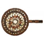 AN OTTOMAN WOOD AND GEOMETRIC MOTHER OF PEARL AND RED STAINED HORN INLAID HAND MIRROR, TRADITIONALLY