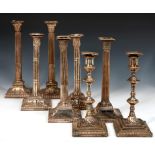 FOUR PAIRS OF SHEFFIELD PLATE CANDLESTICKS, C1765-80 nozzles, 28-35cm h++All in similarly worn