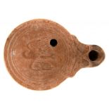 ANTIQUITIES. A ROMAN POTTERY OIL LAMP, C SECOND CENTURY AD 9cm l++No substantial breaks or chips