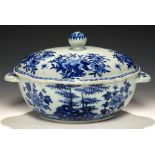 A CHINESE EXPORT PORCELAIN BLUE AND WHITE LOBED OVAL TUREEN AND COVER, C1780 painted with bamboo,