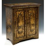 A CHINESE BLACK AND GOLD EXPORT LACQUER TABLE CABINET, EARLY 19TH C the panelled doors enclosing