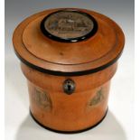 AN UNUSUAL REGENCY CYLINDRICAL FRUITWOOD AND EBONISED TEA CADDY, C1800 inset and applied with cut