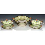 A PAIR OF RIDGWAY MOULDED EARTHENWARE SAUCE TUREENS, COVERS, LADLE AND SIFTER, C1820 with apple