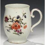 AN EARLY DERBY POLYCHROME MUG, C1756-58 enamelled in the manner of the 'Cotton Stalk' painter, the