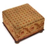 A VICTORIAN WOOLWORK COVERED FOOTSTOOL, MID 19TH C on rosewood base and brass bun feet, 22cm h; 35 x