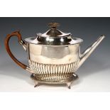 A SHEFFIELD PLATE TEAPOT OF UNUSUALLY LARGE CAPACITY AND STAND, C1810 19cm h++Neat old solder repair