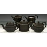 A NEALE & CO BLACK BASALT TEAPOT, 1778-92, ANOTHER ATTRIBUTED TO POOLE, LAKIN & CO, 1792-5 AND THREE