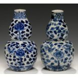 A PAIR OF CHINESE BLUE AND WHITE DOUBLE GOURD VASES, QING DYNASTY, GUANGXU PERIOD painted with peony