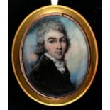 ENGLISH SCHOOL, C1800 A YOUNG MAN in dark brown coat, sky background, ivory, oval, 6.3 x 5cm,