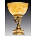 A CONTINENTAL SILVER GILT AND HARDSTONE GOBLET, THE FOOT PROBABLY GERMAN, APPARENTLY EARLY 17TH C