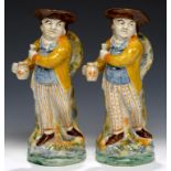 TWO EARTHENWARE HEARTY GOOD FELLOW TOBY JUGS, EARLY 19TH C STYLE similarly decorated, 28cm h++Good