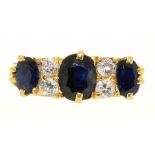 A SAPPHIRE AND DIAMOND RING IN 18CT GOLD, LONDON 1974, THE SAPPHIRES APPROX 1.3CT, OLD CUT