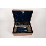 A VICTORIAN ROSEWOOD AND BRASS INLAID DRESSING CASE WITH FITTED INTERIOR AND ACCESSORIES, 28CM H; 20