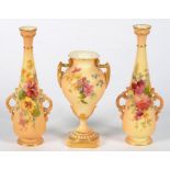 ONE AND A PAIR OF ROYAL WORCESTER VASES, PRINTED AND PAINTED WITH NATURALISTIC FLOWERS ON A SHADED