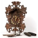 A GERMAN CARVED WOOD CAMERER, KUSS & CO CUCKOO CLOCK, FAULTS