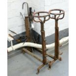 A PAIR OF VICTORIAN IRON FIRE DOGS, 79CM H AND MISCELLANEOUS FIRE IRONS, ETC