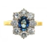 A CEYLON COLOUR SAPPHIRE AND DIAMOND RING IN 18CT GOLD, IMPORT MARKED LONDON 1997, THE OVAL