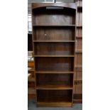 A STAINED PINE OPEN BOOKCASE WITH ADJUSTABLE SHELVES AND ANOTHER SIMILAR, 230 X 98CM AND SMALLER