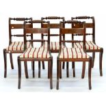 A SET OF FIVE VICTORIAN CARVED MAHOGANY DINING CHAIRS