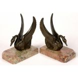 A PAIR OF ART DECO BRONZED SPELTER STYLISED SWAN BOOK ENDS ON MARBLE BASE, 12CM H, C1930