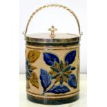 AN EPNS MOUNTED DOULTON WARE BISCUIT BARREL BY GEORGE HUGH TABOR, DECORATED IN SHALLOW RELIEF AND