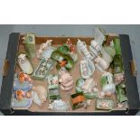 A COLLECTION OF LATE 19TH C CONTINENTAL PORCELAIN PIG FAIRINGS, INCLUDING SEVERAL BANKS, A
