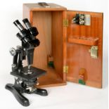 A BECK BINOCULAR MICROSCOPE AND SEVERAL ACCESSORIES, IN FITTED MAHOGANY CASE, 40CM H, TWO RAYNER
