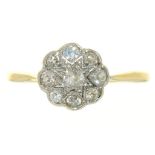 A DIAMOND CLUSTER RING IN 18CT GOLD, SHEFFIELD 2010, THE OLD CUT DIAMONDS APPROX .25CT, 2.5G, SIZE