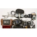 AN ENSIGN SELFIX 820 CAMERA WITH ROSS XPRES F.8 LENS, LEATHER EVEREADY CASE, A ZORKI 35MM CAMERA,