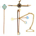 A GOLD STICK PIN WITH OPAL TERMINAL, MARKED 9CT, AN OPAL SET GOLD BROOCH MARKED 9CT AND A RUBY AND