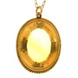 A CITRINE PENDANT ON A GOLD CHAIN MARKED 9CT, CITRINE APPROX 29CT, 9.5G++LIGHT WEAR CONSISTENT
