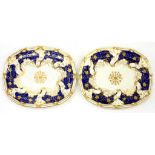 A PAIR OF DAVENPORT BONE CHINA COBALT AND GILT STANDS OR DISHES, WITH RIBBON MOULDED RIM, 31CM L,