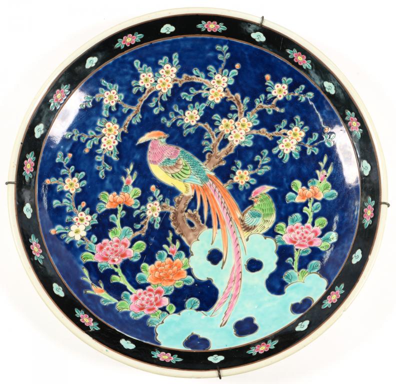 A JAPANESE PORCELAIN PLAQUE, ENAMELLED WITH BIRDS IN BRANCHES, 45CM D, 20TH C