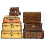 VINTAGE LUGGAGE. THREE VICTORIAN AND EDWARDIAN LEATHER OR CANVAS COVERED AND WOOD SLATTED TRUNKS,