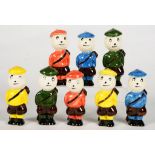 A SET OF EIGHT CARLTON WARE FIGURES OF GOLFERS WITH GOLF BALL SHAPED HEADS, 8.5CM H, PRINTED MARK