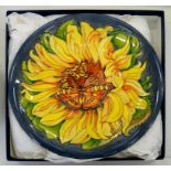 A MOORCROFT CHILDREN IN NEED SUNFLOWER AND BUTTERFLY PLATE, 26CM D, IMPRESSED AND PAINTED MARKS,