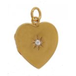 A HEART SHAPED GOLD LOCKET, C1900 the front gipsy set with an old cut diamond, 2.6cm, 5g ++Good