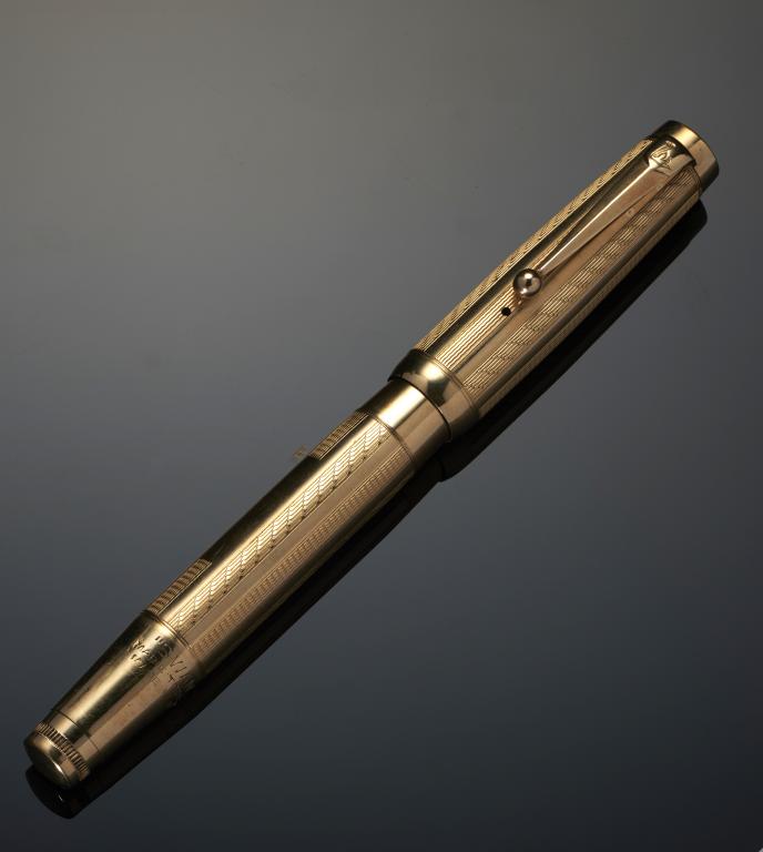 A MABIE, TODD & CO LTD GOLD PLATED LEVERLESS SWAN FOUNTAIN PEN, mid 20th c gold nib marked 3 14ct,