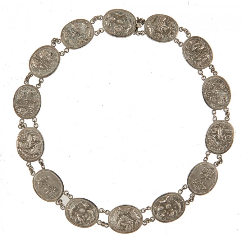 A CHINESE SILVER NECKLACE, LATE 19TH C of fourteen oval repousse plaques of immortals, dragons,