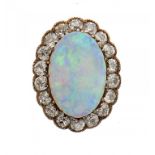 AN OPAL AND DIAMOND BROOCH, C1910 with old cut diamonds, in gold, 1.7cm l, 2.8g++An attractive