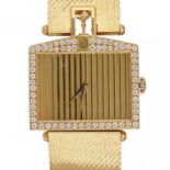 A CORUM DIAMOND SET 18CT GOLD GENTLEMAN'S WRISTWATCH ROLLS ROYCE 55596/319504 on case back, quartz