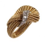 KUTCHINSKY. A DIAMOND COCKTAIL RING in the form of delooped 18ct gold ruffle, maker's mark London