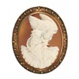 A VICTORIAN CAMEO BROOCH, C1860 the oval shell carved with Hebe, mounted in gold with applied